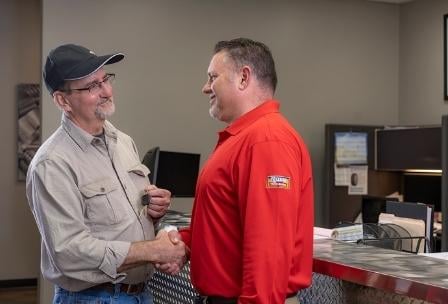 Rush Truck Leasing employee shaking customer's hand